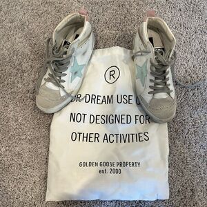 Mid Star sneakers with "Love is everything" lettering